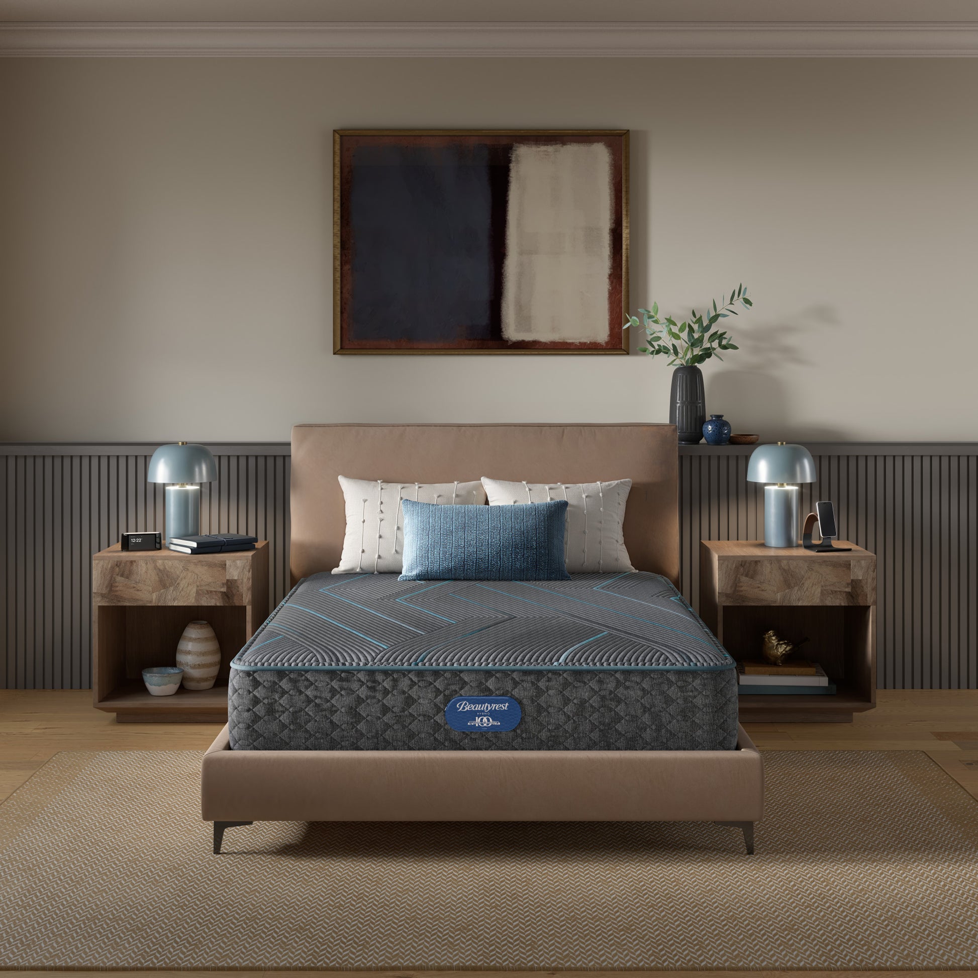 Beautyrest Hybrid Medium Firm Mattress mattress sitting in a beige bed frame with 3 pillows on top of it