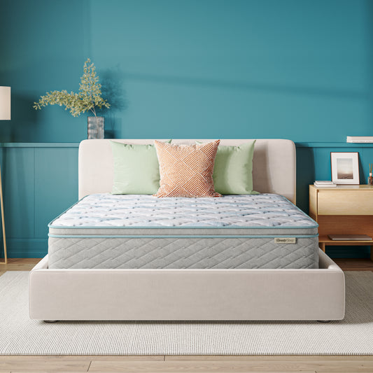 Beautysleep Mattress in a grey bedframe with 3 pillows on top of it within a bedroom setting