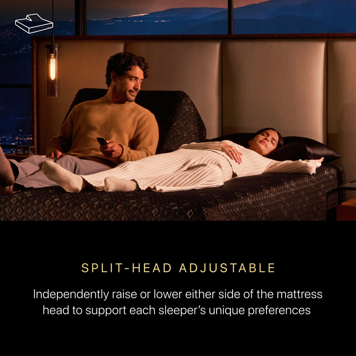 Image of a woman and man laying on a Beautyrest black luxury adjustable base.  The caption under the image states Split-Head Adjustable.  Independently raise or lower either side of the mattress head to support each sleeper's unique preferences.