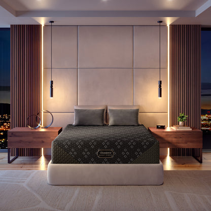 Modern bedroom with a cream bed frame featuring a Beautyrest Black Hybid XCS mattress, nightstands, and decorative elements.