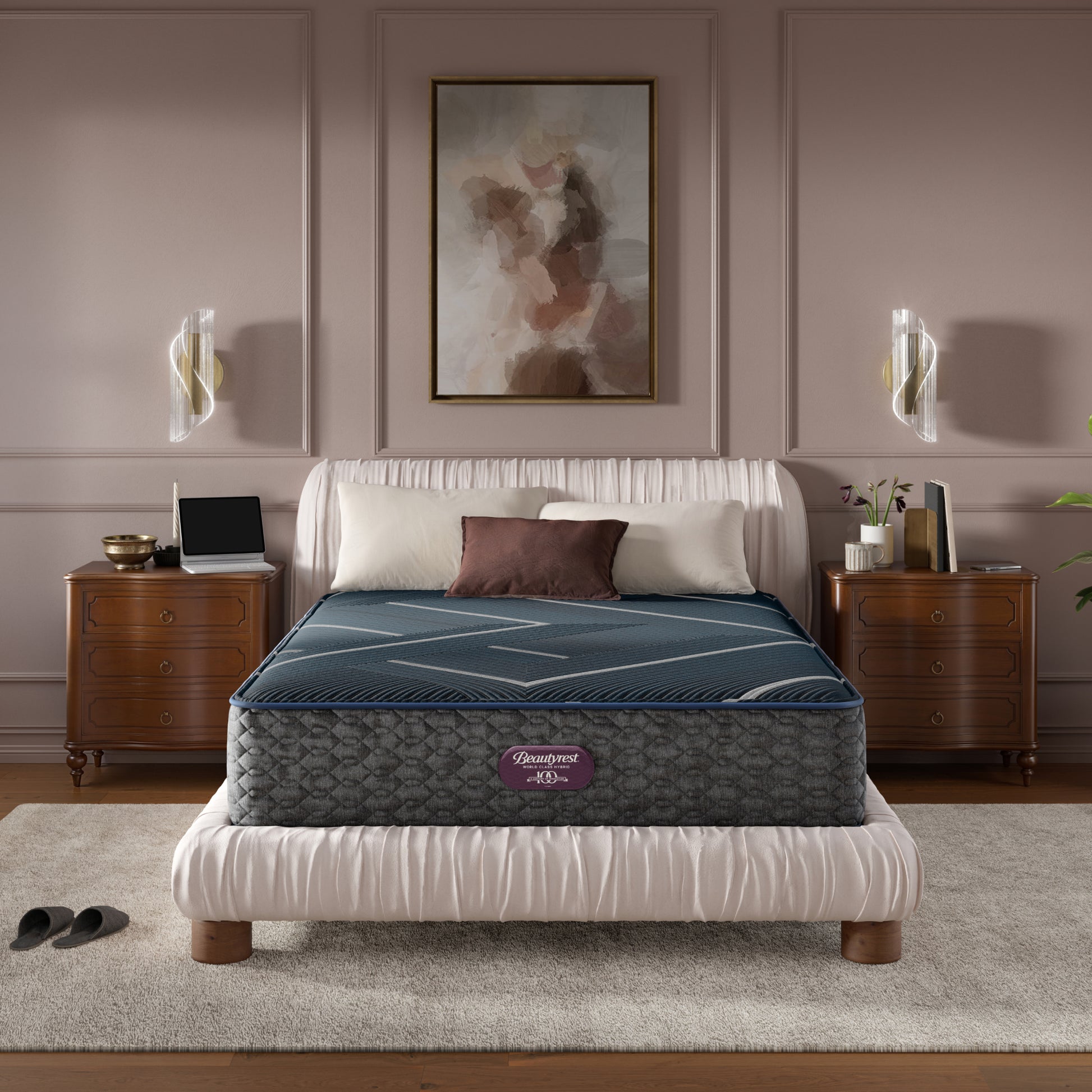 Beautyrest World Class Quilted Hybrid mattress sitting in a brown bed frame with 3 pillows on top of it