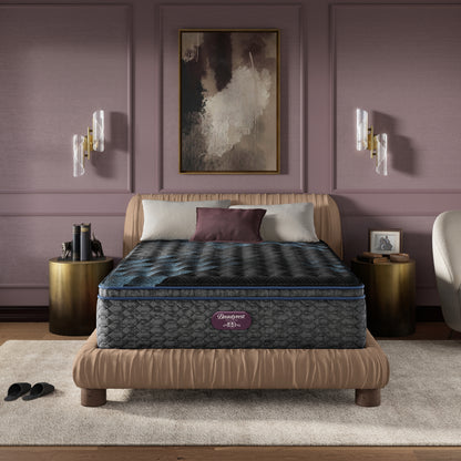 Beautyrest World Class mattress sitting in a brown bed frame with 3 pillows on top of it